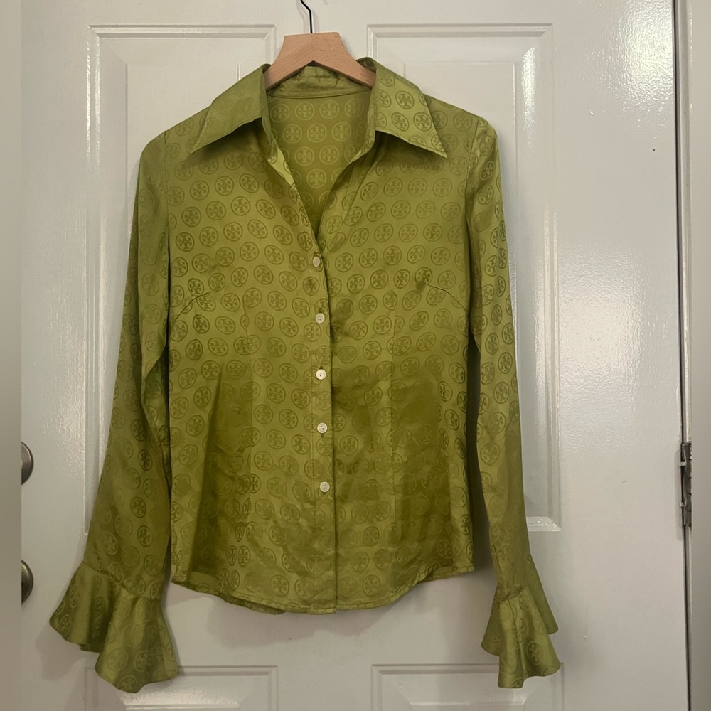 Woman’s-green-long-sleeved, satin button-down blouse 
W/geometric pattern